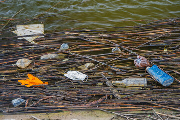 Coronavirus is contributing to pollution, as discarded face masks clutter riverside Danube river...