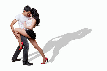 two people dancing. Beautifu young woman and man dancing salsa