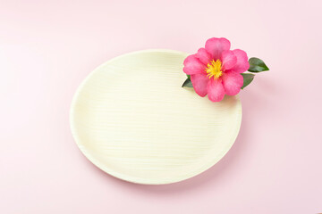 Bamboo disposable plate with pink tropical flower