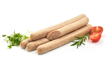 German White Thin sausages with herbs and tomatoes, isolated on a white background. Close-up.