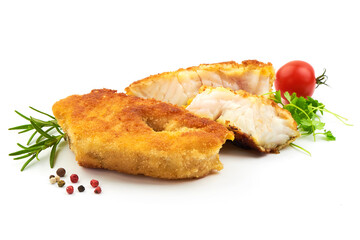 Crispy breaded fish fillet with herbs, pepper and tomatoes, isolated on a white background. Close-up
