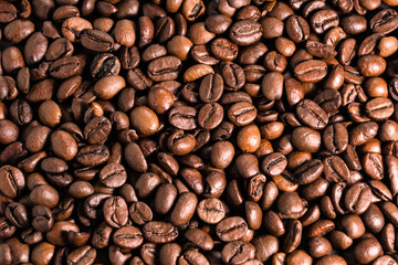 Roasted coffee beans texture background, brown grains