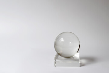 Crystal ball, glass ball. Interior detail, home design item. Simple shapes.