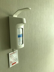 Personal disinfectant sanitizer liquid used in hospital for hygienic living. Alcohol dispenser for cleaning hand to protect from virus. Hygiene concept. Copy space.