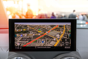 Modern car GPS navigation on dashboard.
