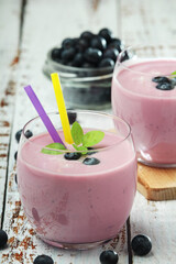 Two glasses with blueberry yogurt