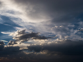 Spectacular blue sky with clouds and sun rays