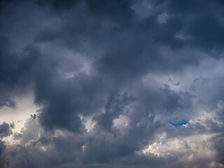 Spectacular blue cloudy sky with sun rays