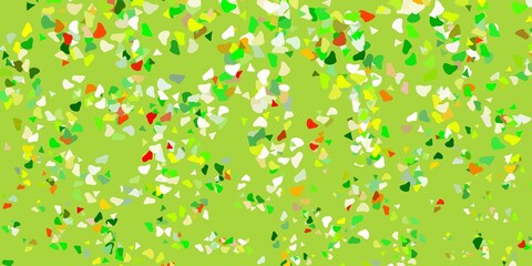 Light green, yellow vector backdrop with chaotic shapes.
