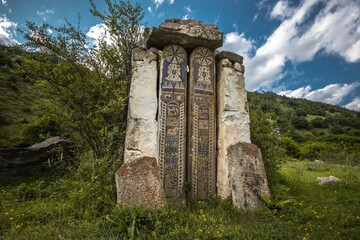 Fototapeta na wymiar Beautifully decorated monument in the Caucasus mountain, North Ossetia, Russia.