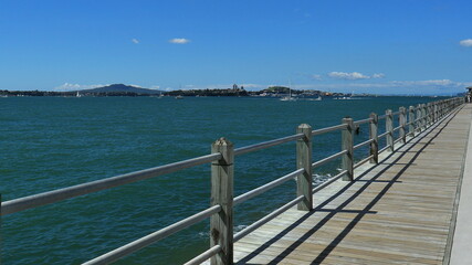 View from Westhaven Marina boardwalk, across Waitemata Harbour, to Devonport and Rangitoto Island, Auckland, NZ