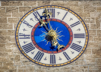 Fototapeta na wymiar A clock at New Town Hall (Neues Rathaus in German) in Munich, Germany.