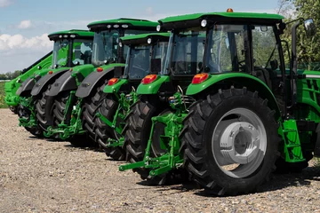 Foto op Canvas New agricultural tractors in stock © scharfsinn86
