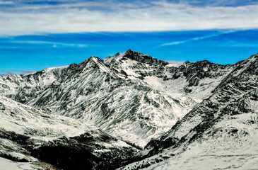 Mountains under snow during winter in Dolomites, North Italy, Bormio region.