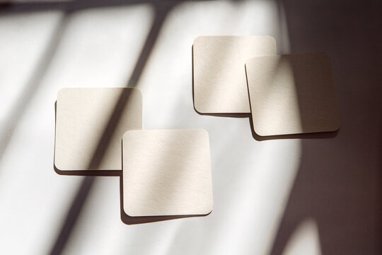 coasters under the sun with shadows