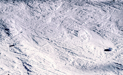 Landscape view over land and mountains covered with snow in popular ski resort Bormio in Italy.