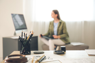 Table with tools for calligraphy in office