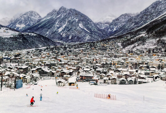 Panoramically view over famous ski town during cloudy winter day in Bormio, Italy.
