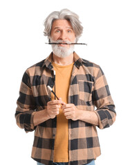Funny senior calligraphist on white background