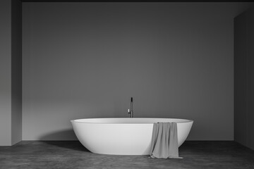 Obraz na płótnie Canvas Grey bathroom interior with bathtub