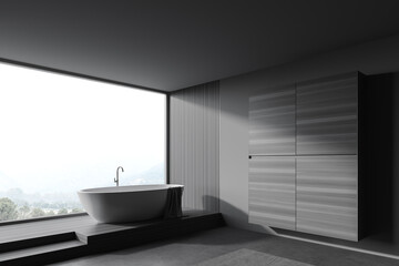 Fototapeta na wymiar Grey and wooden bathroom with tub and wardrobe