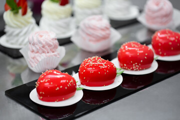 Handmade desserts are on the table in the pastry shop