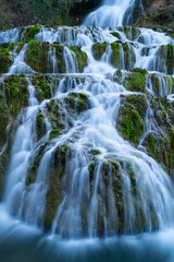 Fototapeta na wymiar Waterfall in Orbaneja del Castillo, Sedano Valley, Burgos, Castilla y Leon, Spain, Europe