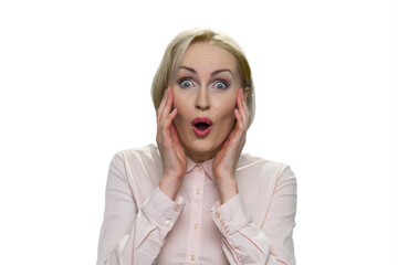 Extremely shocked businesslady with her mouth opened. Isolated on white background.