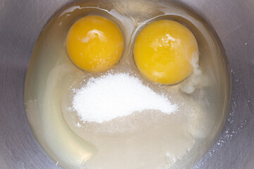 Happy smiling face made of eggs, top view