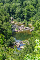 Fototapeta premium telephoto view of water flowing in Little River Canyon National Preserve, Alabama, USA