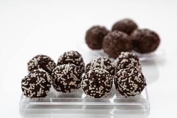 chocolate candies on white background