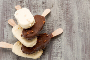 chocolate ice cream on wooden background
