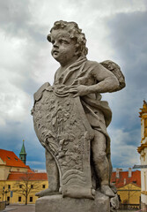 Fototapeta na wymiar Sculpture of cherub in Prague, Czech Republic