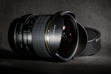 Professional fisheye lens on black background for amateurs