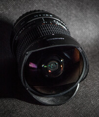 Professional fisheye lens on black background for amateurs