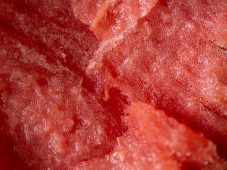 Juicy ripe watermelon in half on a white table