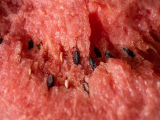 Juicy ripe watermelon in half on a white table