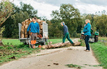 Multi-generation family cutting firewood