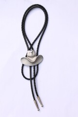 Cowboy leather bolo tie with a silver Stetson