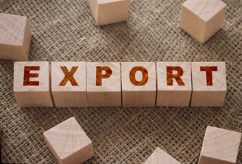Export Word on Wood Cubes on a burlap. Trade reselling business concept
