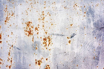 Metal texture with scratches and cracks which can be used as a background