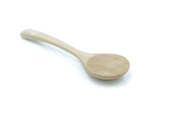 wooden spoon on a white background                     