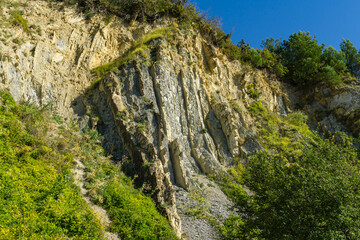 Beautiful natural texture of Caucasus mountains on the Black Sea coast in Olginka. Stones and rock fragments of different sizes as original background. Selective focus