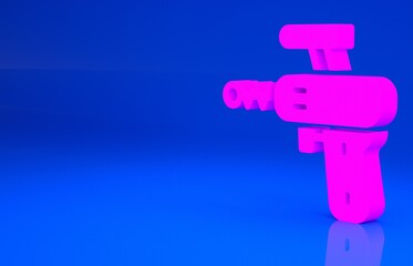 Pink Ray gun icon isolated on blue background. Laser weapon. Space blaster. Minimalism concept. 3d illustration. 3D render..