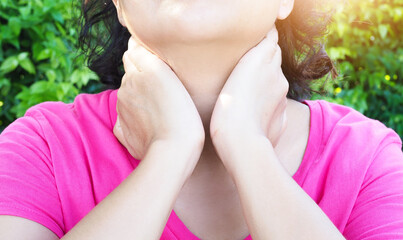 Women with chronic sore throat sickness from colds or tonsils