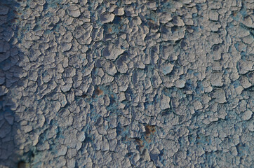 background of old faded and chipping old paint on a wooden surface	