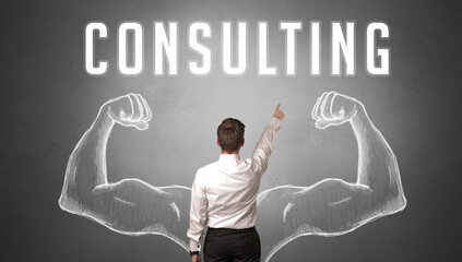 Rear view of a businessman with CONSULTING inscription, powerfull business concept