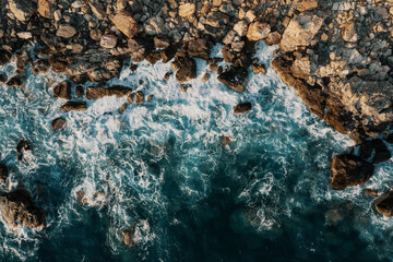 Beach and waves top view. Turquoise water background aerial view. Summer seascape from air. Top view from drone. Travel concept idea