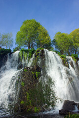beautiful waterfall in armenia forest