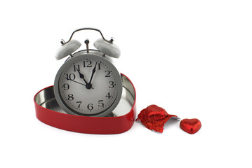 Retro alarm clock in a red heart shaped box